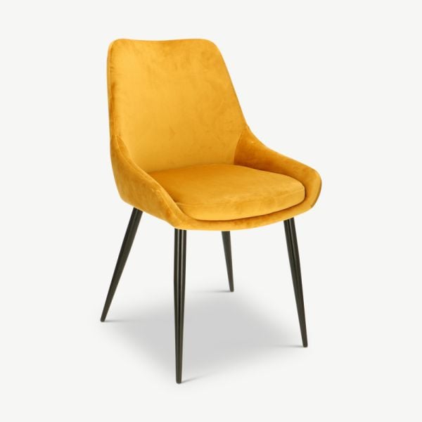 Fleur spisebordsstol, gul velour & sorte ben set fra skrå vinkel
