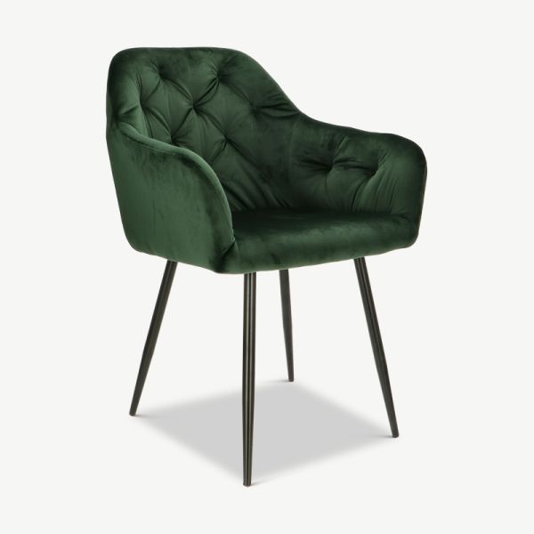 Vinny spisebordsstol, grøn velour & sorte ben set fra skrå vinkel